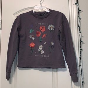 A dark purple sweater